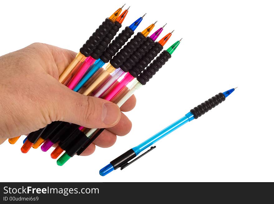 Pencils in hand on white background