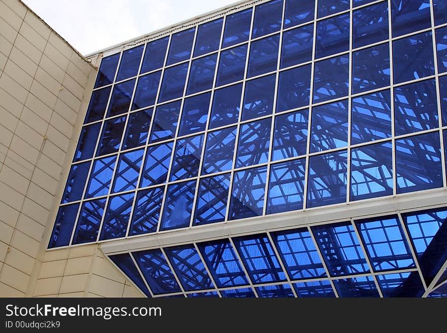 Glass architectural design of a modern building. Glass architectural design of a modern building.