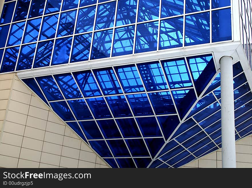 Glass architectural design of a modern building. Glass architectural design of a modern building.