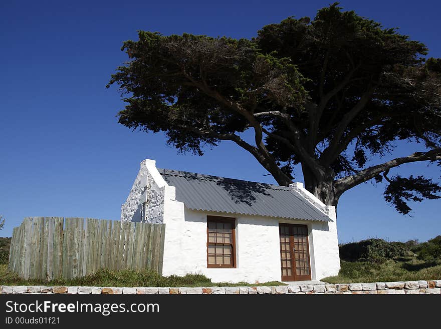 Small white house near buffelsfontein visitors centre within the table mountain national park near the cape of good hope cape town western cape province south africa