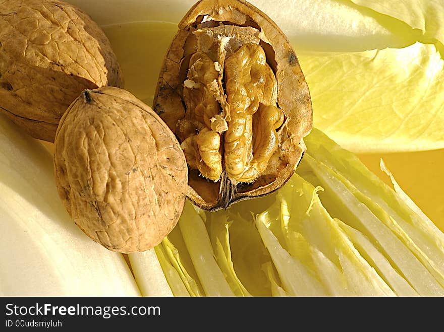 Fresh endive leaves and walnuts. Fresh endive leaves and walnuts