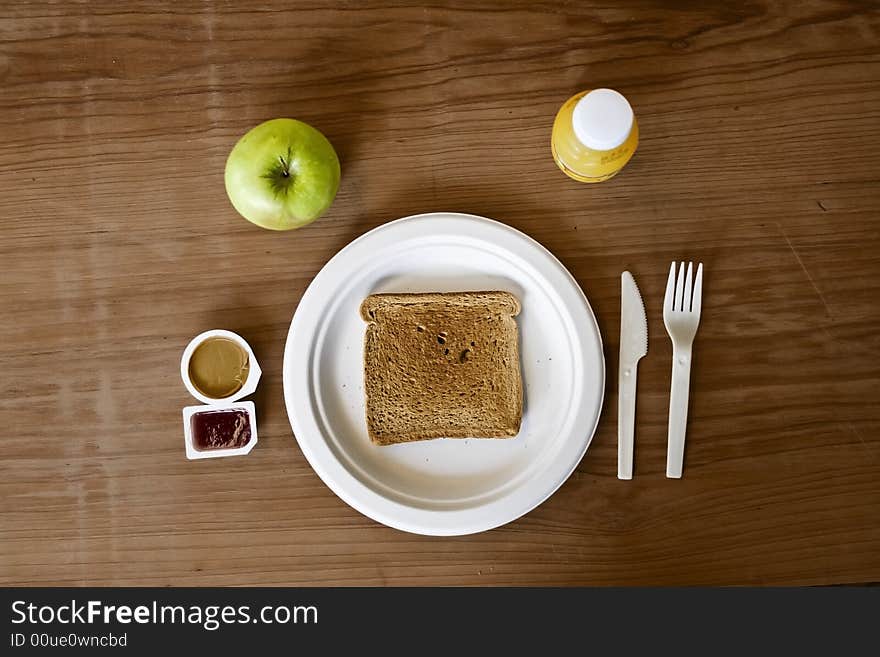 It's a breakfast using throwaway silverware. It's a breakfast using throwaway silverware.