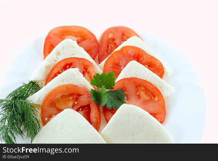 Tomato and cheese on white background. Tomato and cheese on white background