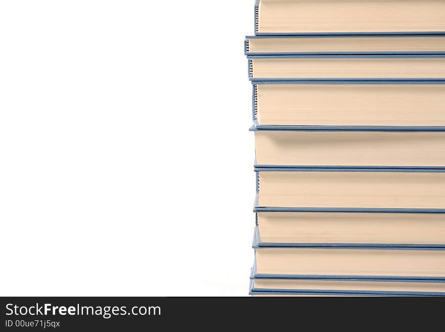 Stack of books on white background