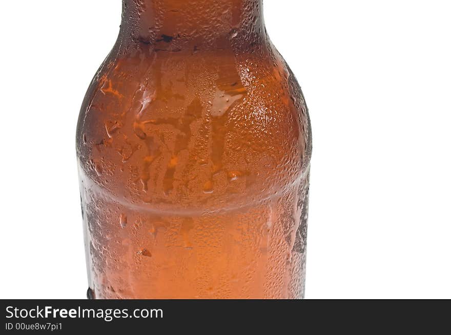 Close-up of the shoulder of a ice cold bottle of beer, isolated against white. Close-up of the shoulder of a ice cold bottle of beer, isolated against white.