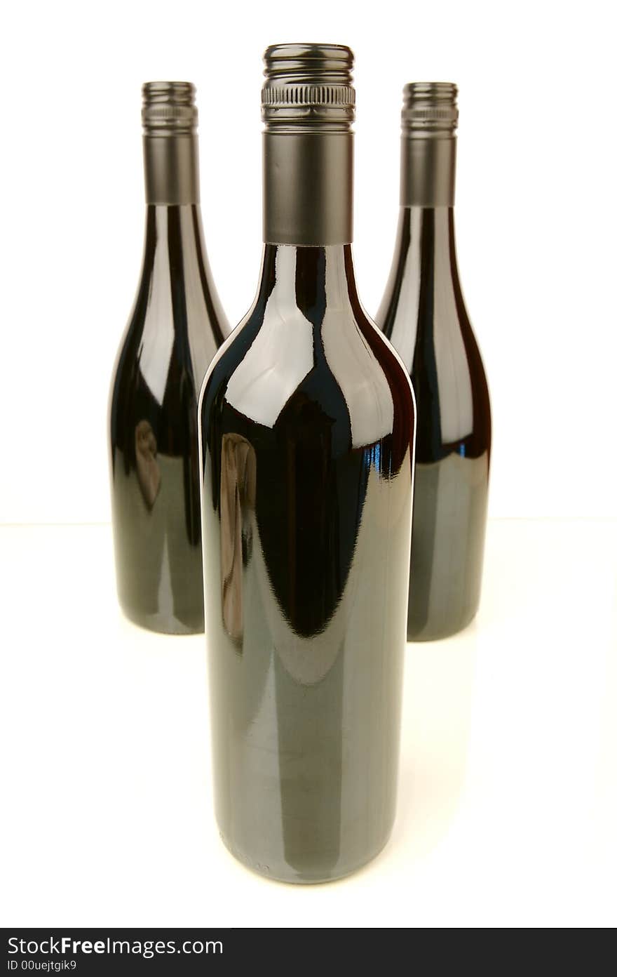 Bottles of wine isolated against a white background