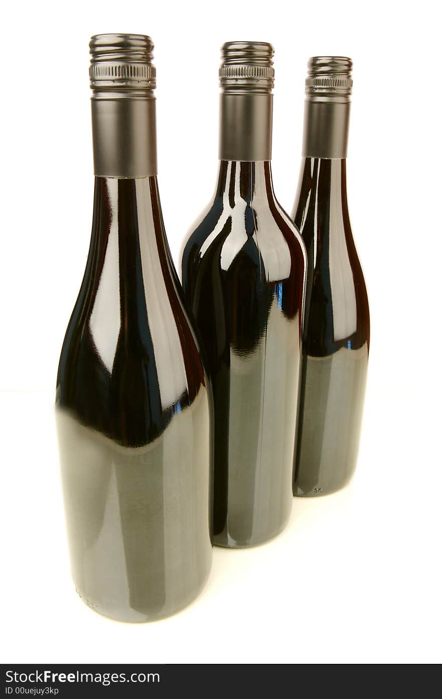 Bottles of wine isolated against a white background