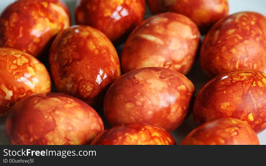 Close-up view to homemade easter eggs, coloured with onion