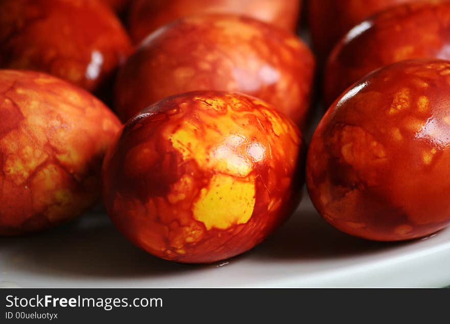 Close-up view to homemade easter eggs, coloured with onion