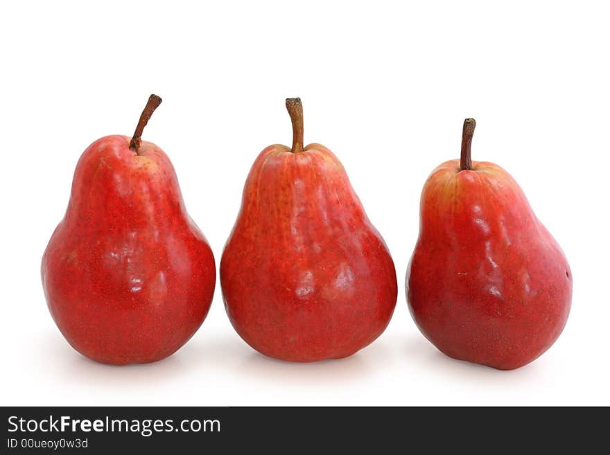 Three red pears isolated on white background