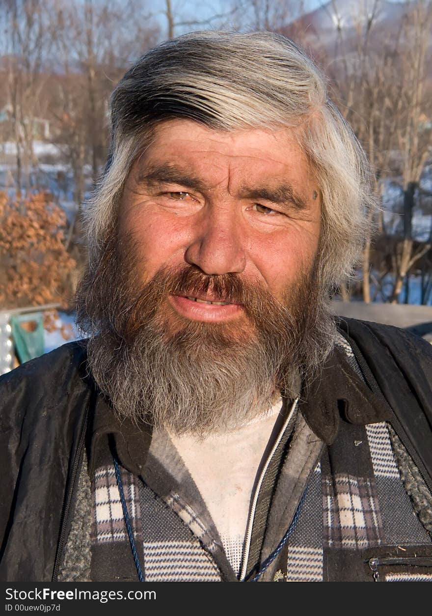 A portrait close-up of the men, the representative of one of small indigenous peoples of Russian Far East. His name is Valery Eusan. Primorsky Region, settlement Preobrazhenie. A portrait close-up of the men, the representative of one of small indigenous peoples of Russian Far East. His name is Valery Eusan. Primorsky Region, settlement Preobrazhenie.