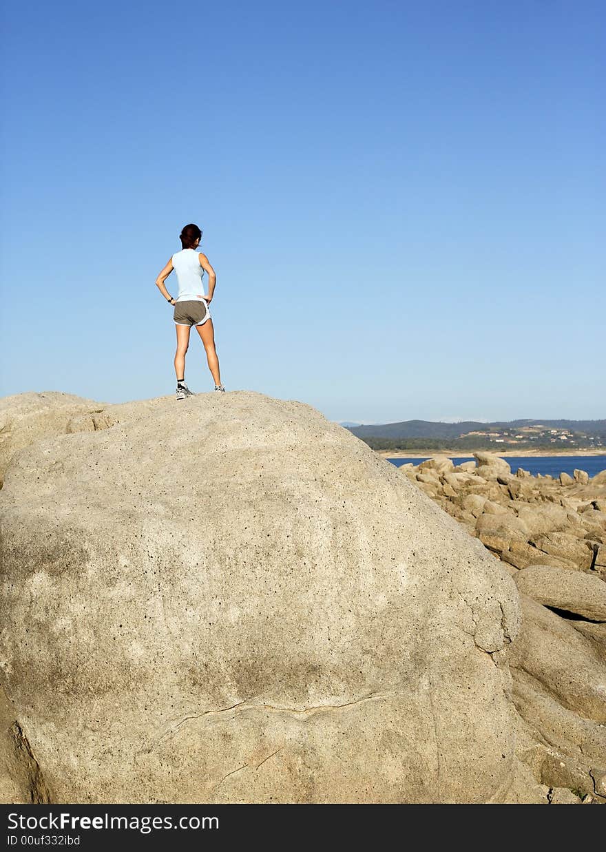 Woman on top of the mountain