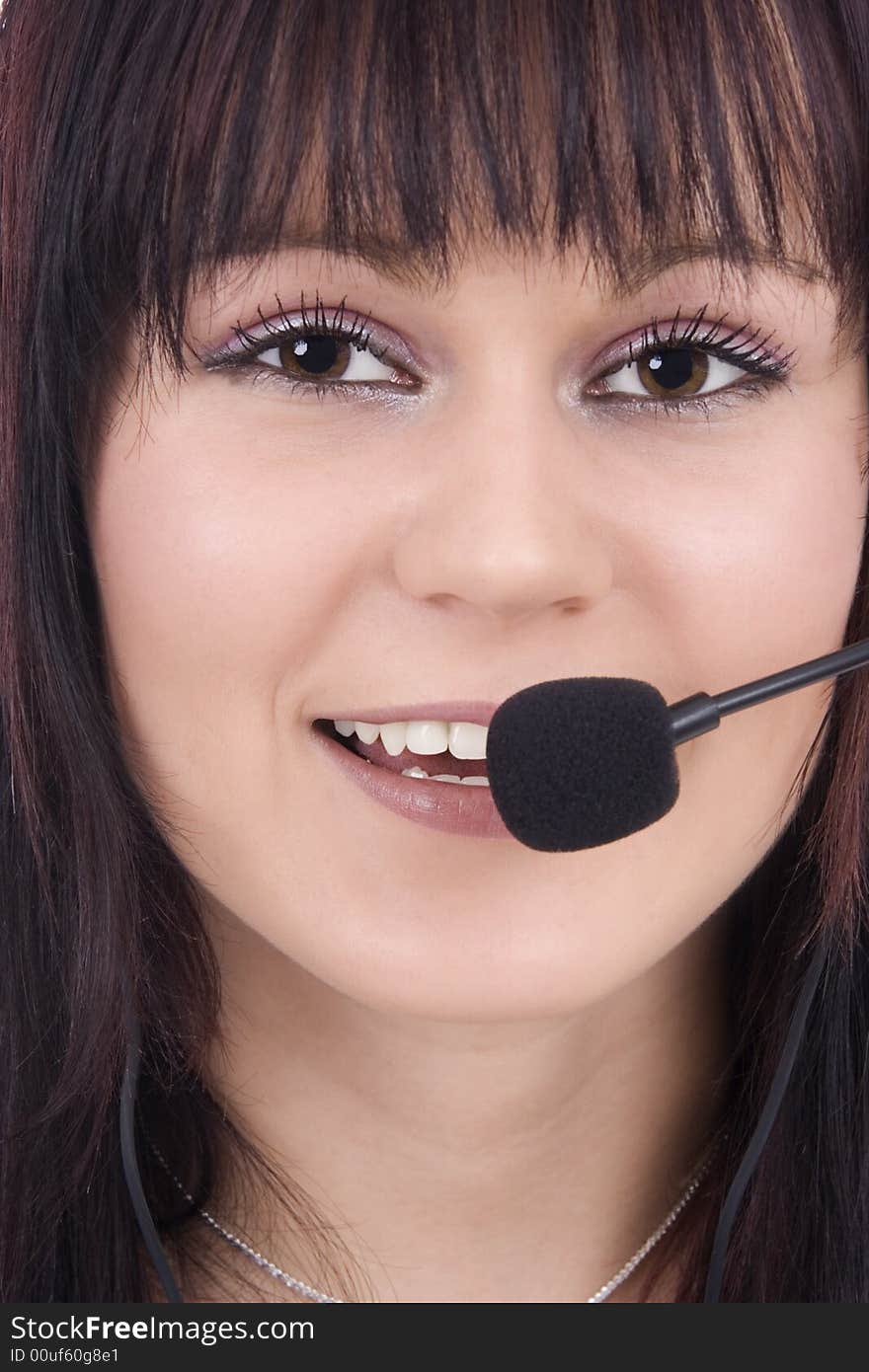 Woman telephonist with hands-free phone. Woman telephonist with hands-free phone