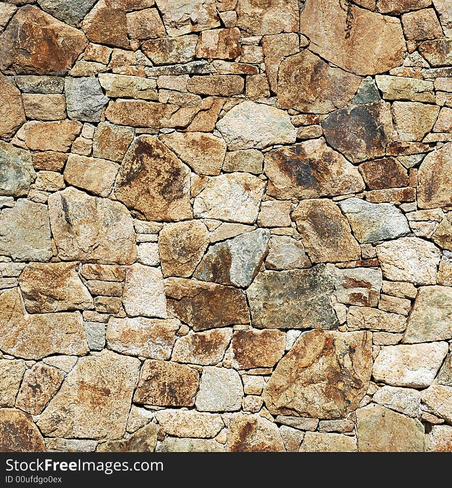 Old colored stone wall texture
