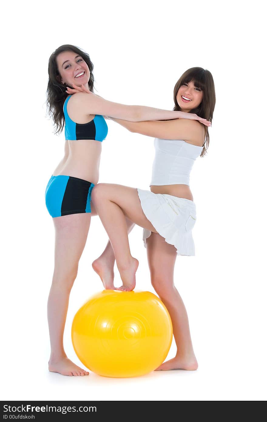 Girls practicing fitness  on  white  background