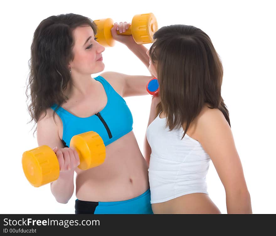 Girls practicing fitness  on  white  background