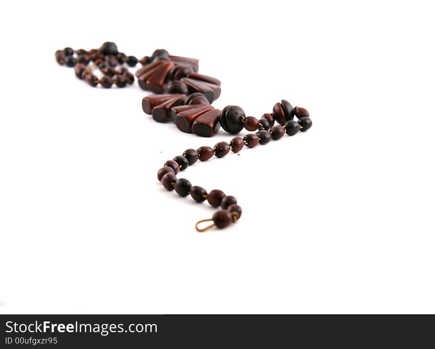 Wooden beads on white background