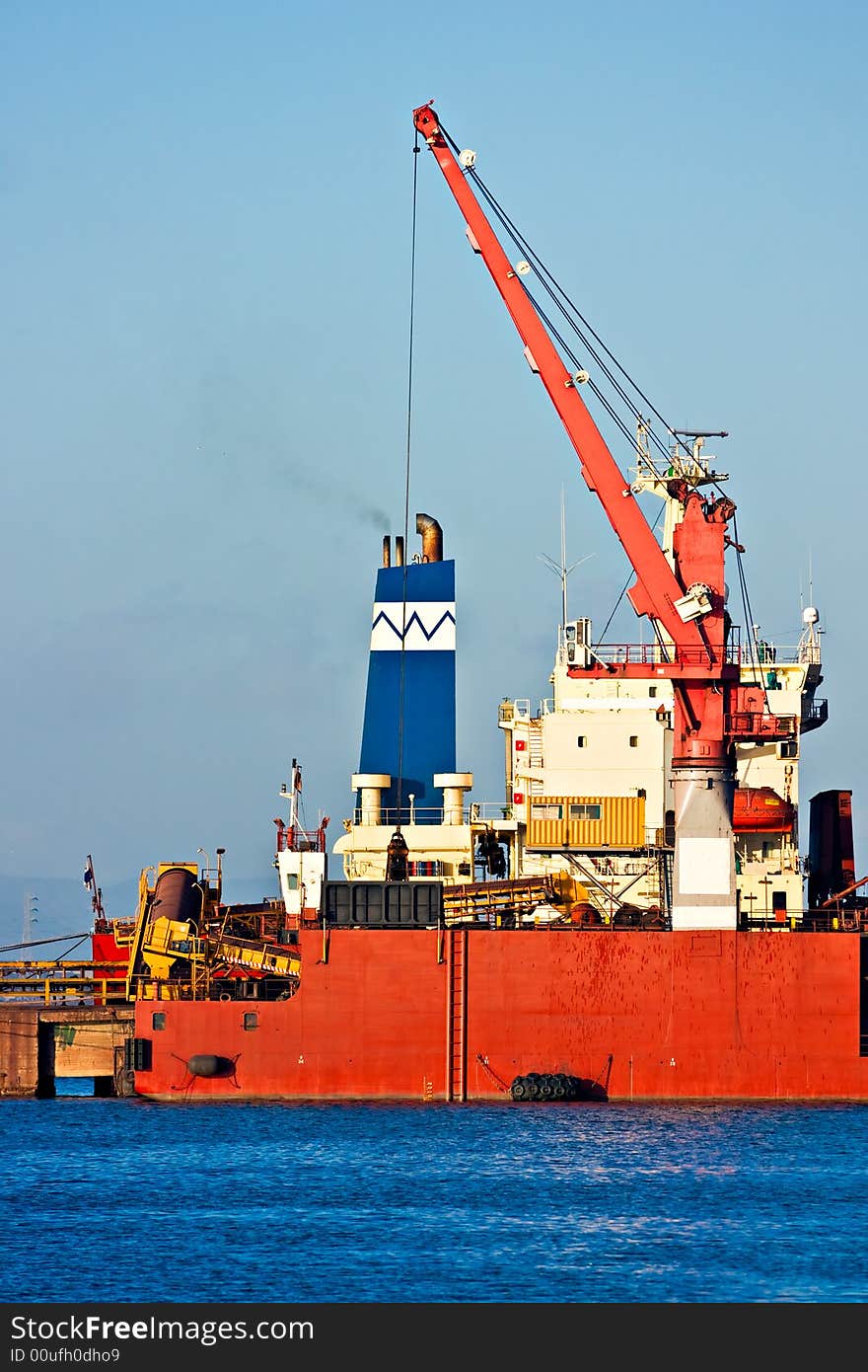 Crane in Piombino harbor, Tuscany, Italy. Crane in Piombino harbor, Tuscany, Italy.