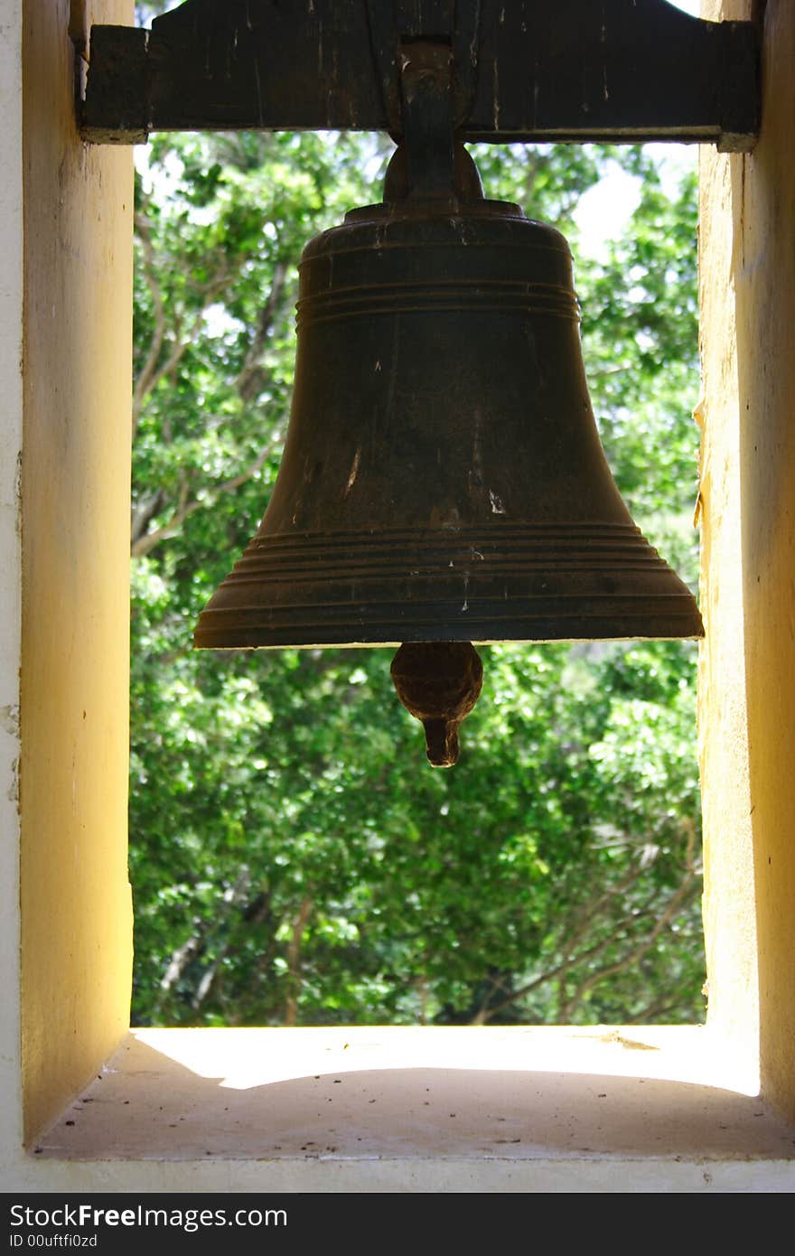 A bronze, metallic church bell.