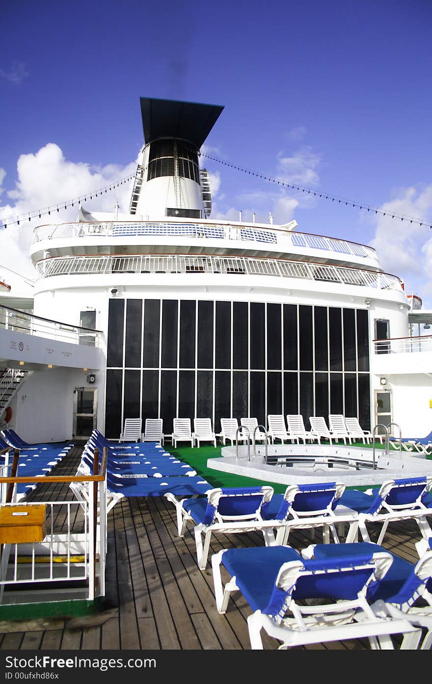 Cruise ship sun deck with chairs.