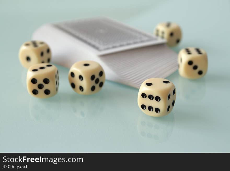 Dice on a glass matt table