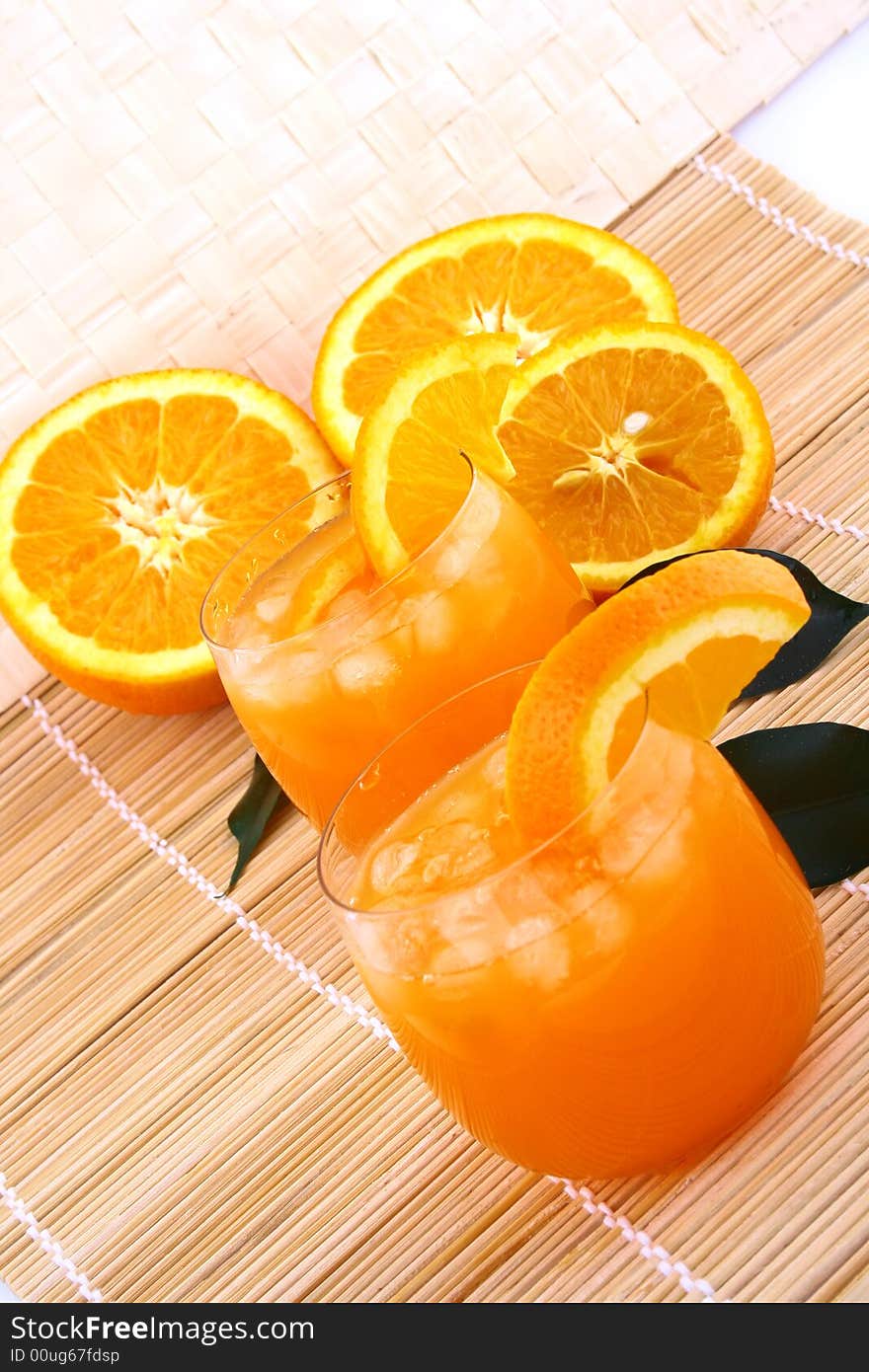 Orange and orange juice in a glass