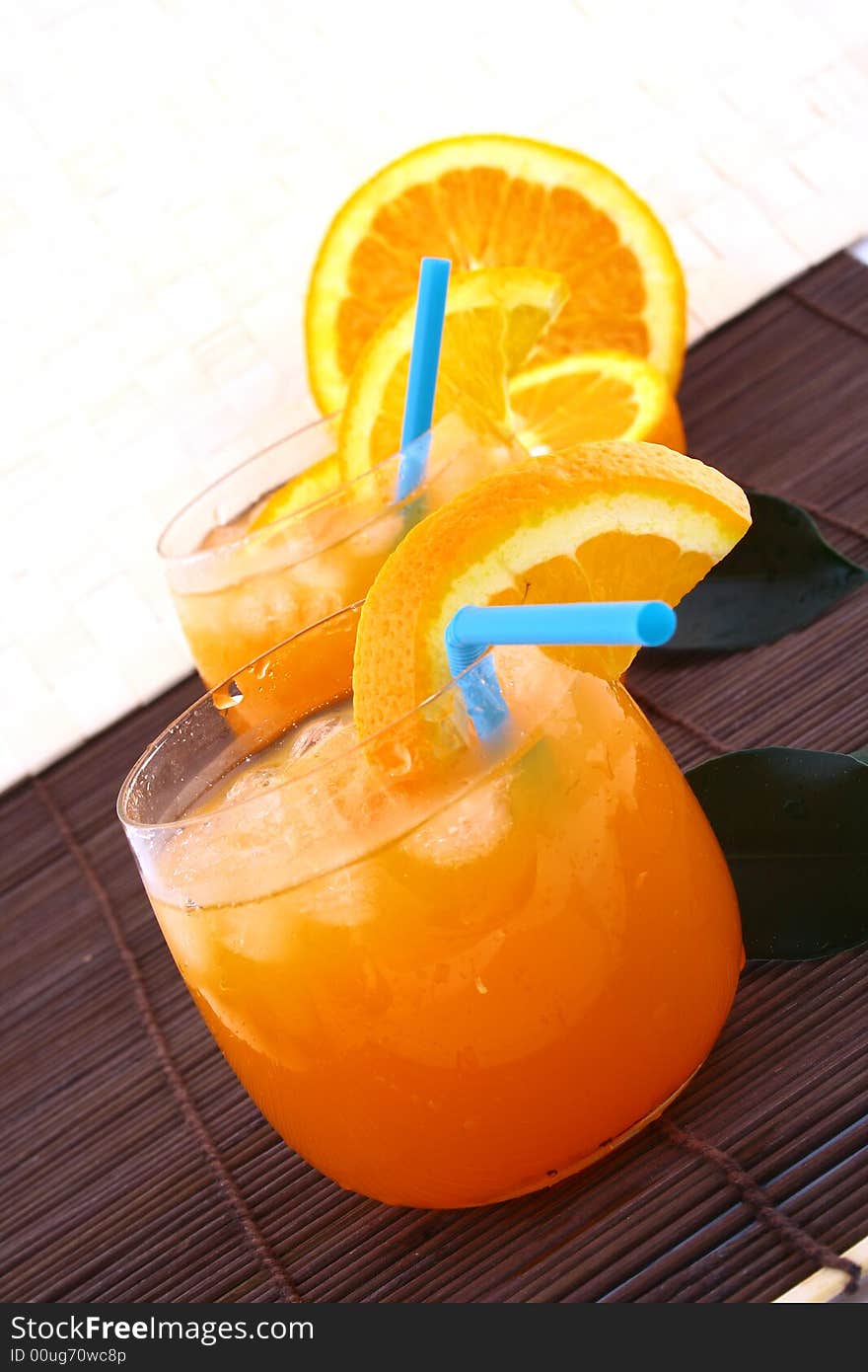 Orange and orange juice in a glass