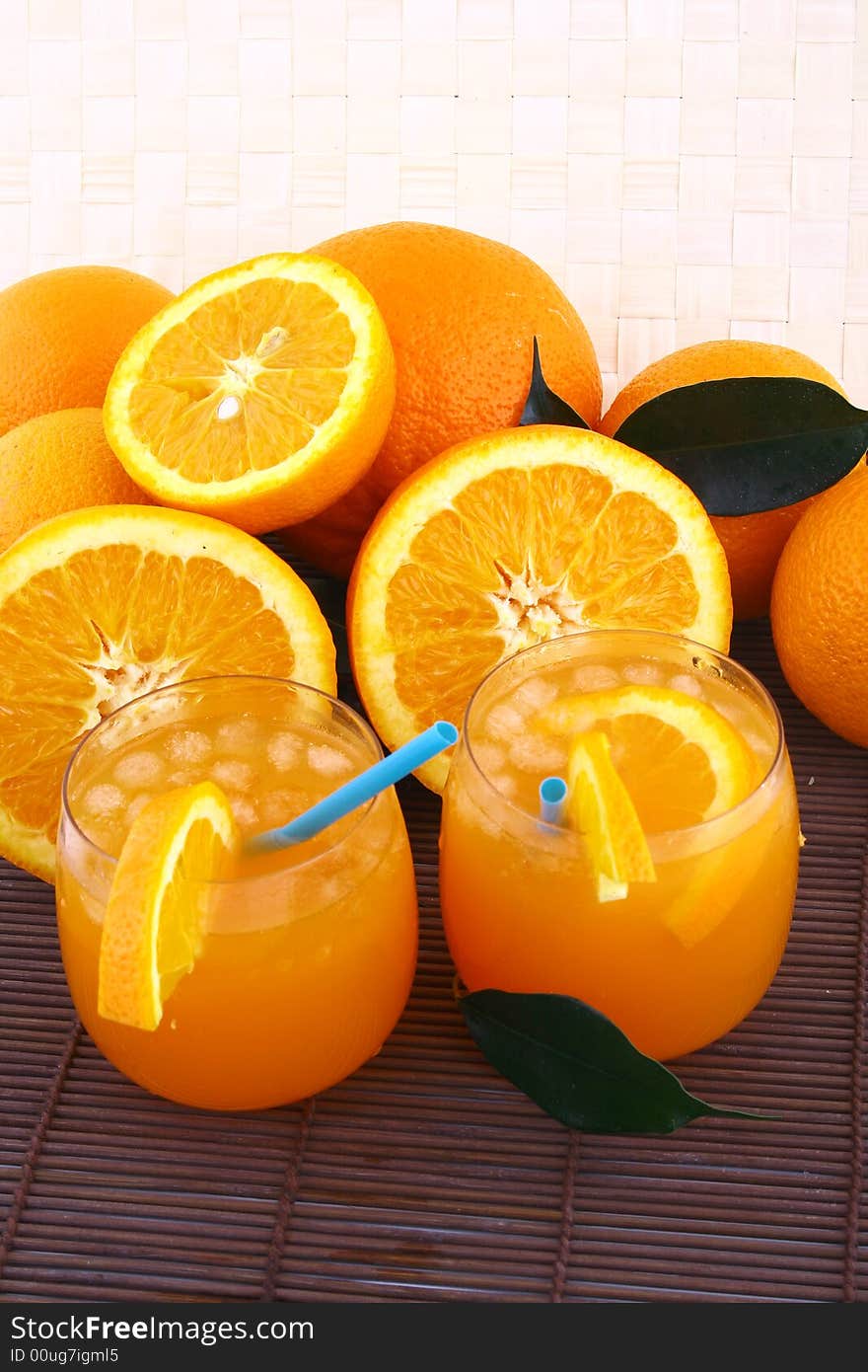 Orange and orange juice in a glass