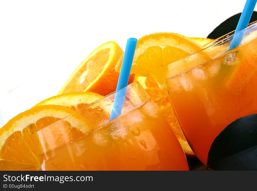 Orange and orange juice in a glass