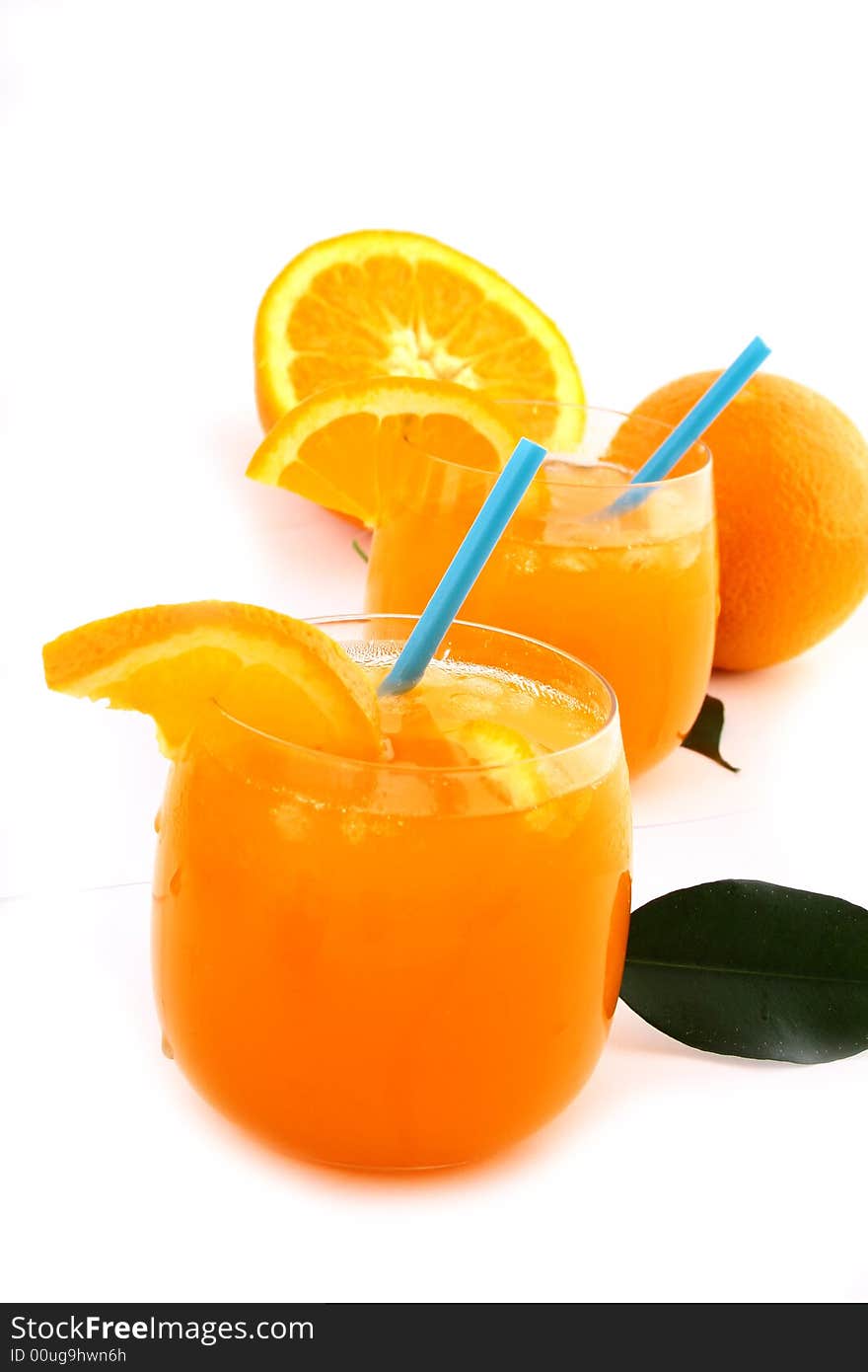 Orange and orange juice in a glass