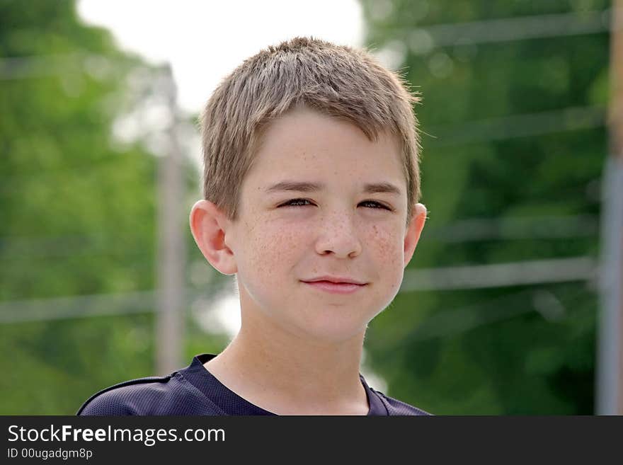 Teenage Boy Outside With a big Smirk. Teenage Boy Outside With a big Smirk