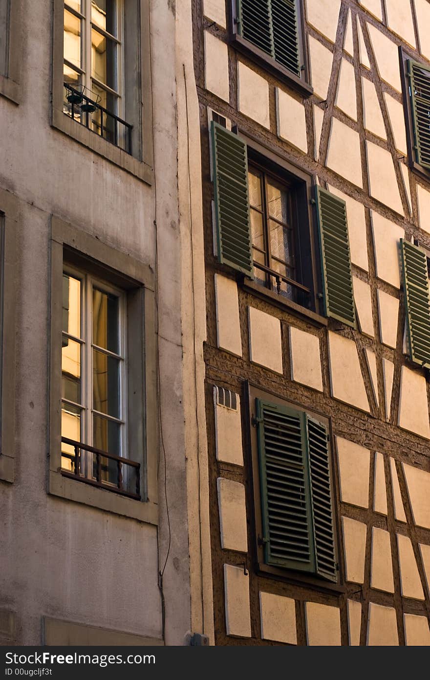 Historical Half Timbered facade under golden glow of sunset in Strasbourg. Historical Half Timbered facade under golden glow of sunset in Strasbourg.