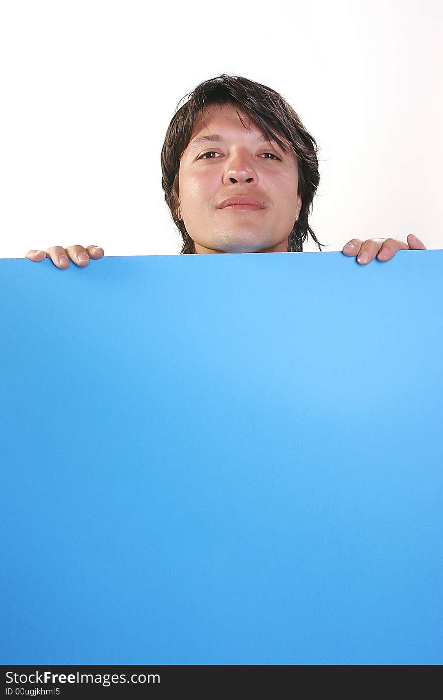 Young man holding blue billboard. Young man holding blue billboard