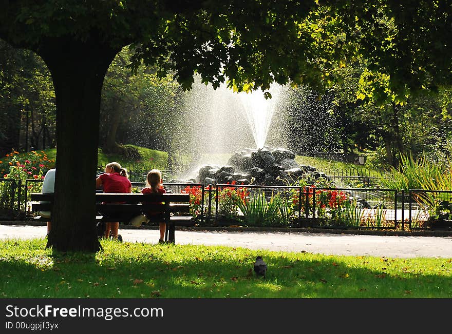 Afternoon in the park where peple like to relax in sunny and warm day. Afternoon in the park where peple like to relax in sunny and warm day.