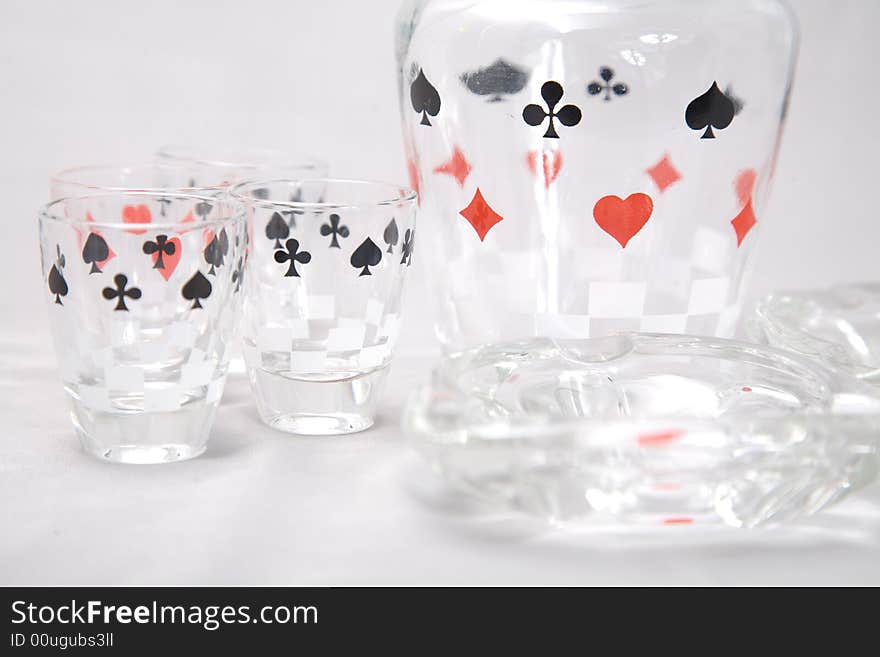 A set of liquor glasses with cards pattern