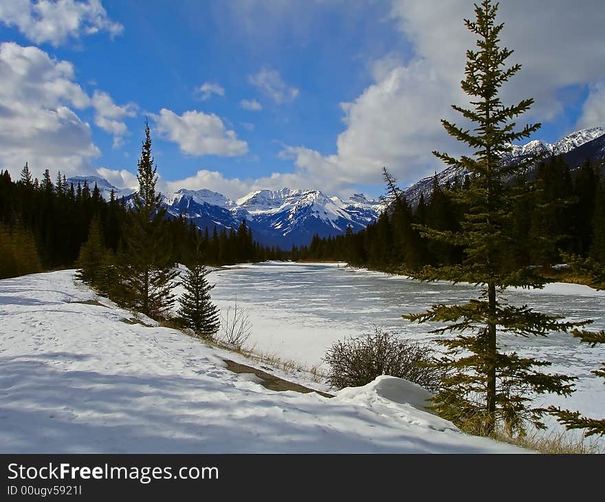 Canadian Rocky Mountains winter landscape with a river. Canadian Rocky Mountains winter landscape with a river