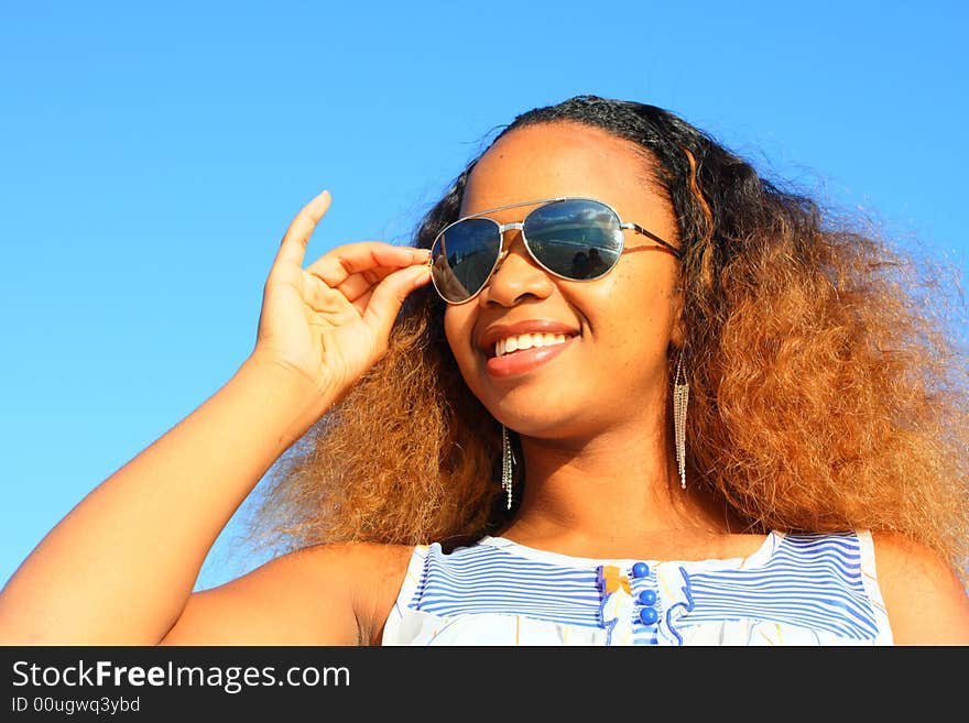 Woman Fixing Her Glasses