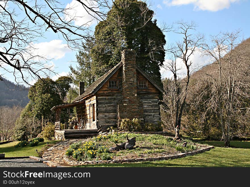 Log Cabin With Rock Chimney