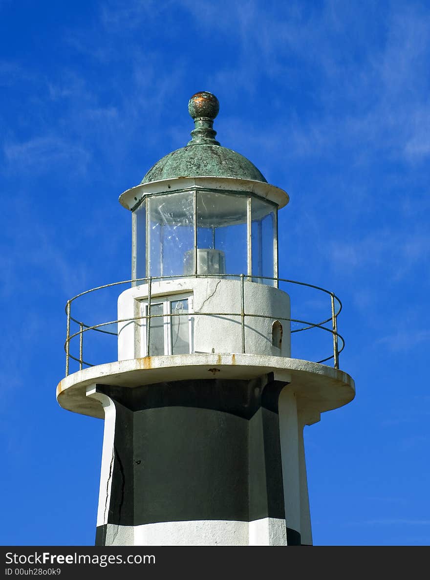 Beacon on a background of the blue sky. Beacon on a background of the blue sky