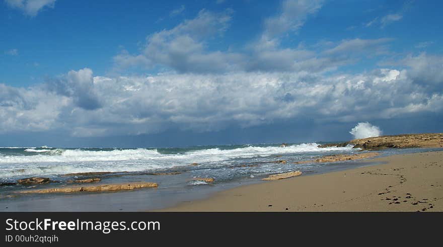 The sea the sky of a cloud of a wave. The sea the sky of a cloud of a wave