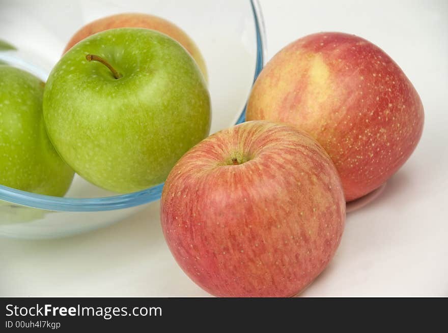 Green and red apples on a white background. Green and red apples on a white background.