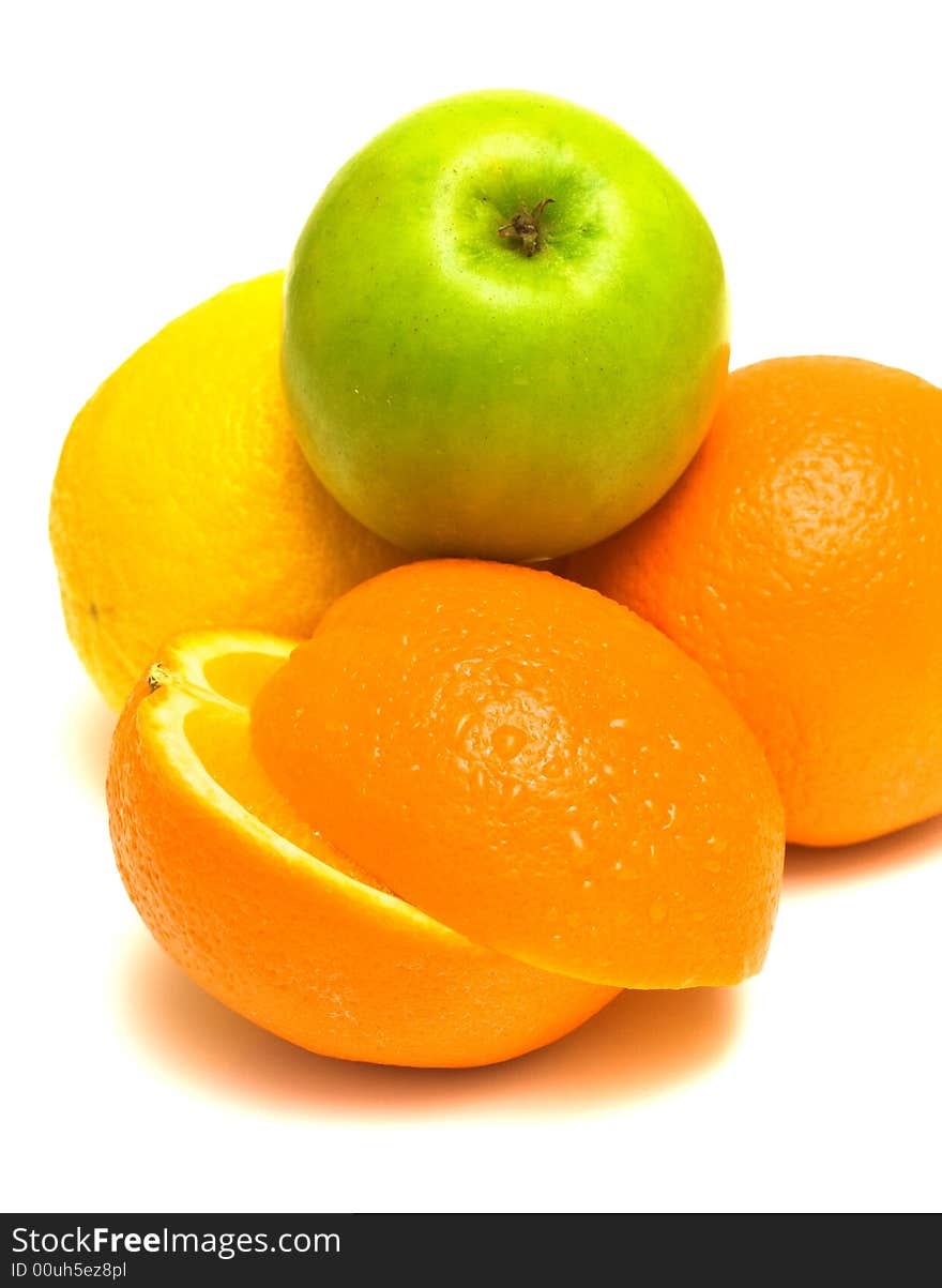 Orange, lemon and green apple