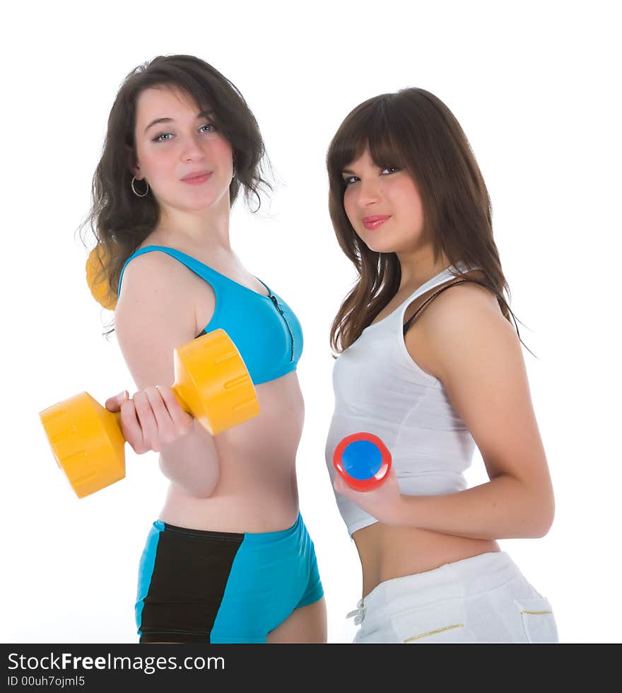 Girls practicing fitness  on  white  background