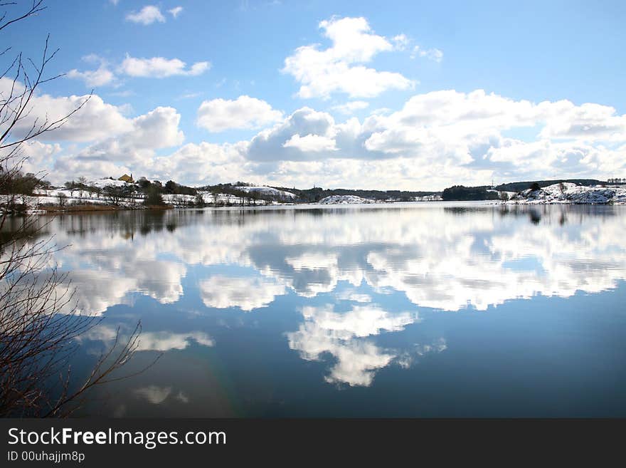 Rural cloudscape by the lake