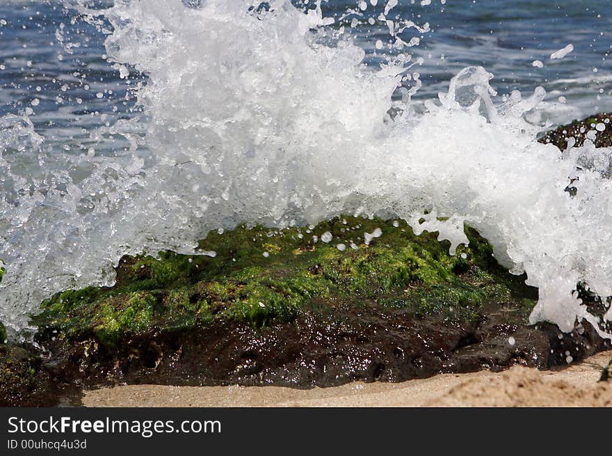 Splash on rock