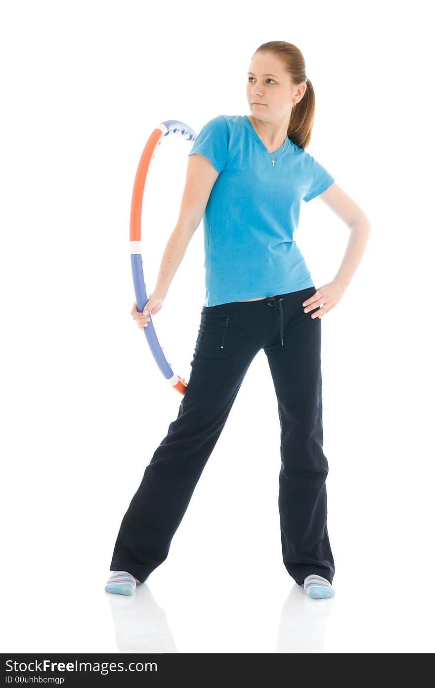 The young woman with the hoop isolated on a white background