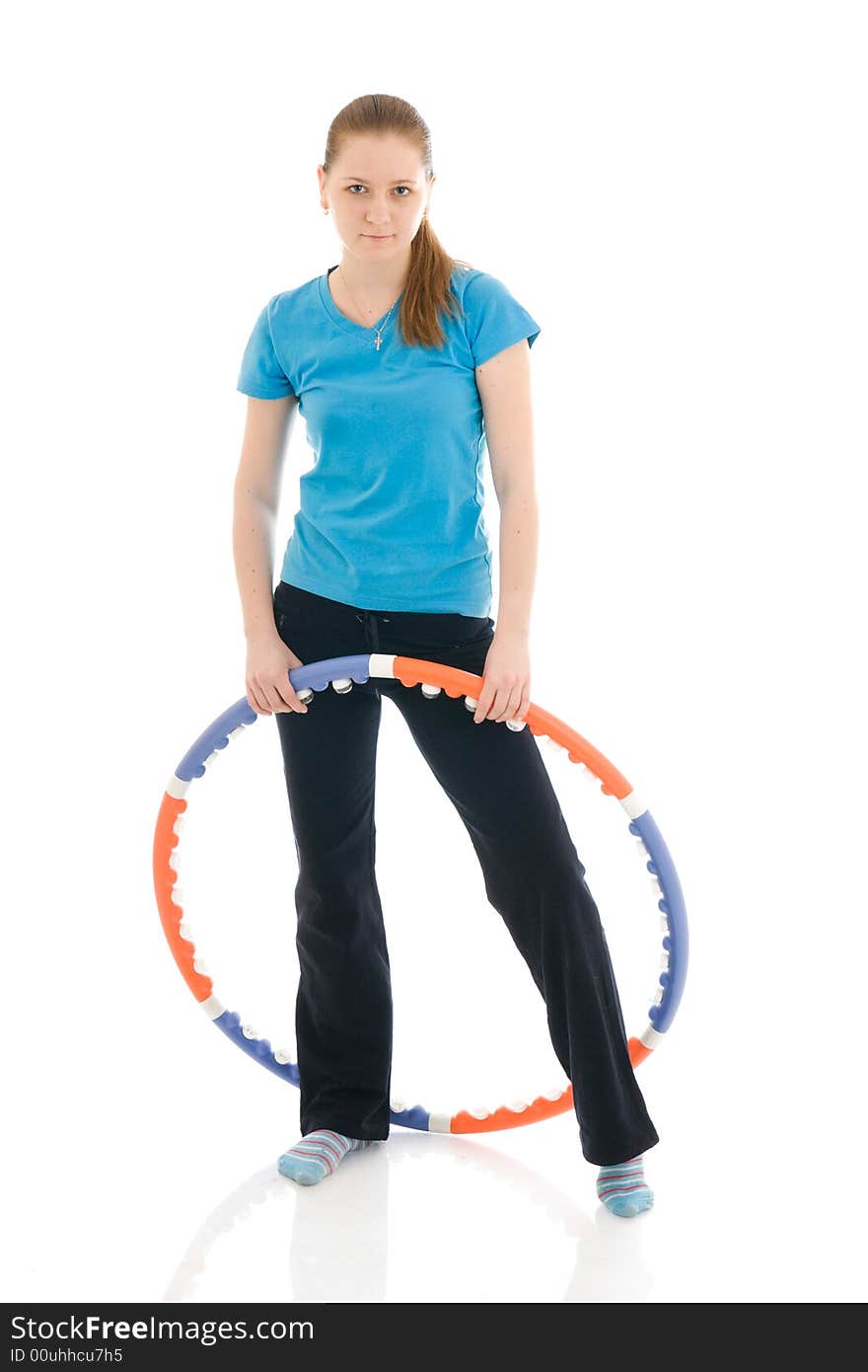 The young woman with the hoop isolated on a white background