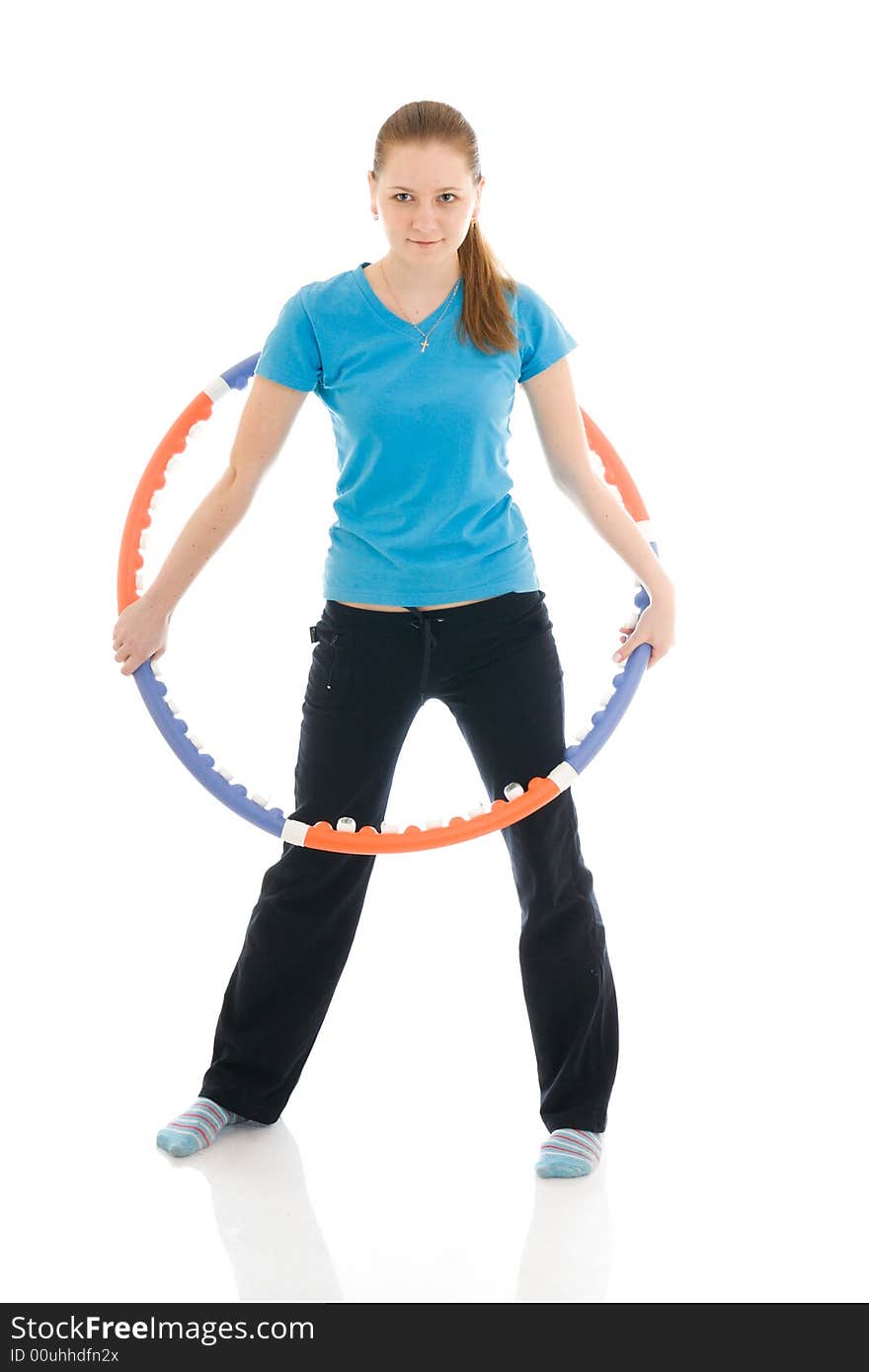 The young woman with the hoop isolated on a white background