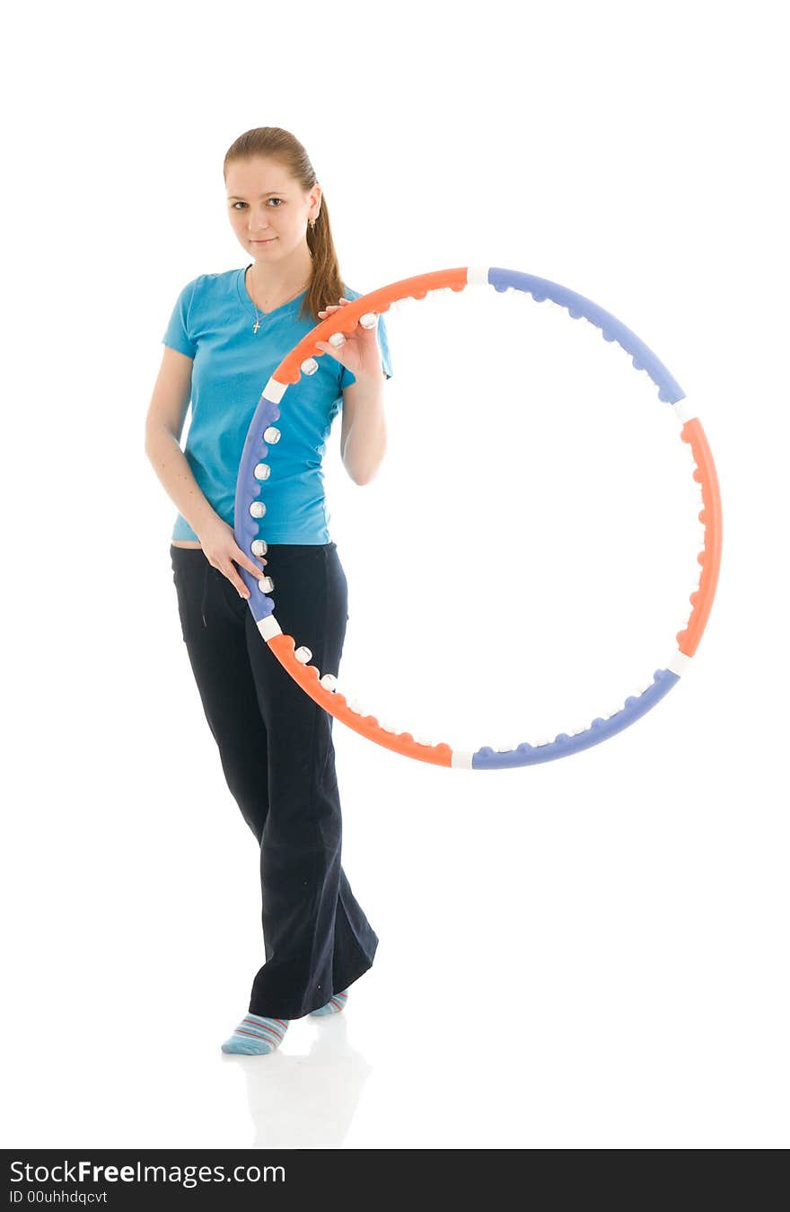 The young woman with the hoop isolated on a white background