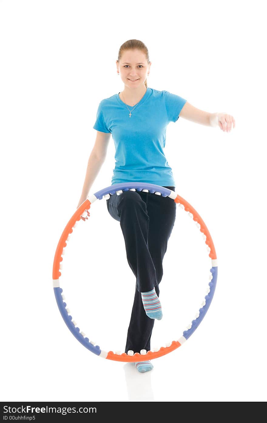 The young woman with the hoop isolated on a white background